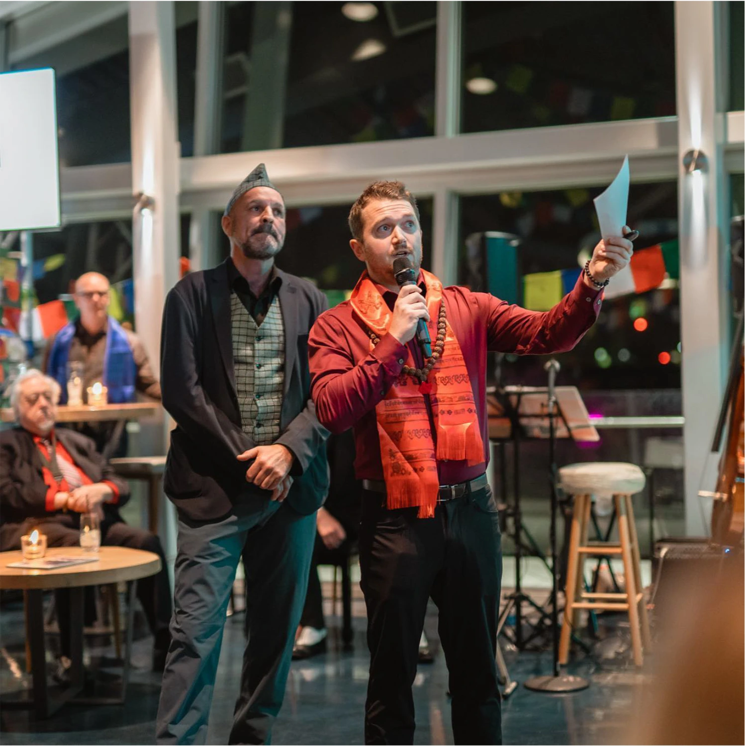 Kyle Sawyer speaking at event hosted by Another Brick in Nepal